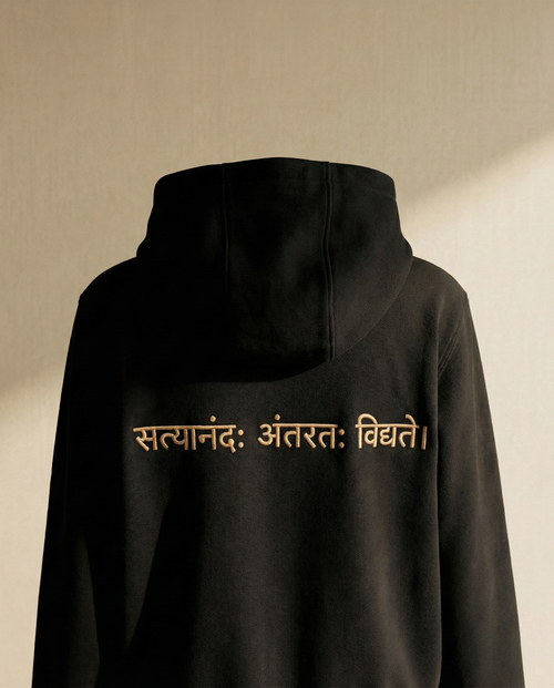 WOVYN Contentment Collection Hoodie - Obsidian Black, back view on a ghost mannequin with Sanskrit embroidery “सत्यानंदः अंतरतः विद्यते।”
